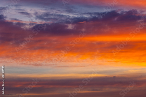 Texture, background, pattern. Evening, morning sky, bright colors on the clouds.Colorful sky and sunrise. Natural landscape. Early morning sky with colors from deep blue to orange. © na9179126124