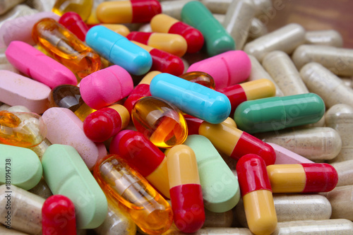 Medical or vitamin pills. Colorful medicine pills as texture. Pill pattern ba...