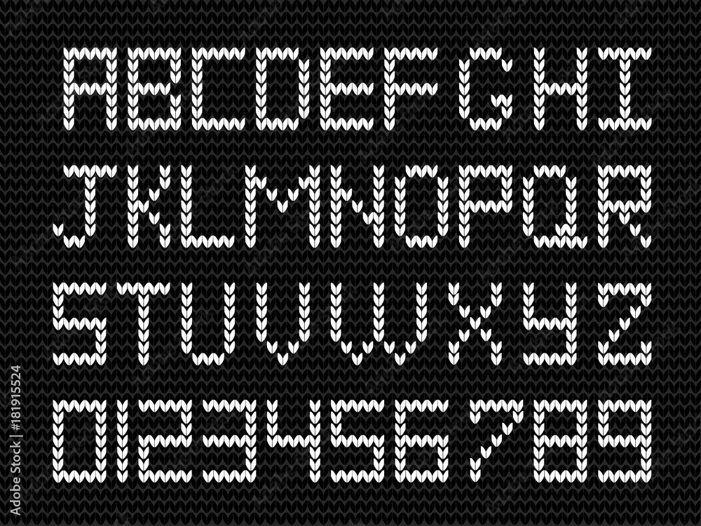 White knitted script on charoal black knit background.