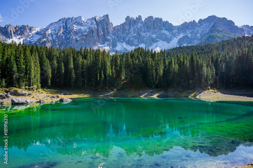 Beautiful view alpine lake with mountains in the Dolomites in South Tyrol  Italy.  Lago di Carezza  Karersee.