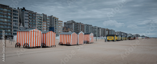 Row of vinage beach huts photo