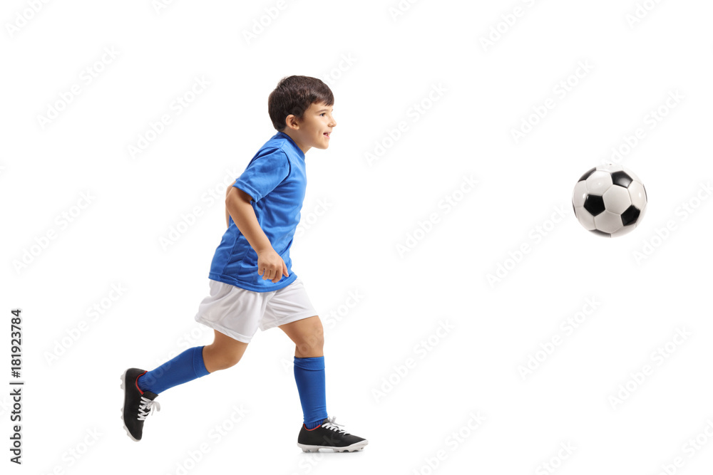 Little footballer running