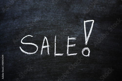 Sale Written On Black Chalkboard