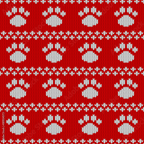 Abstract knitted dog paw seamless pattern background. Knit texture for design new year card, christmas invitation, holiday wrapping paper, winter vacation travel and ski resort advertising etc.