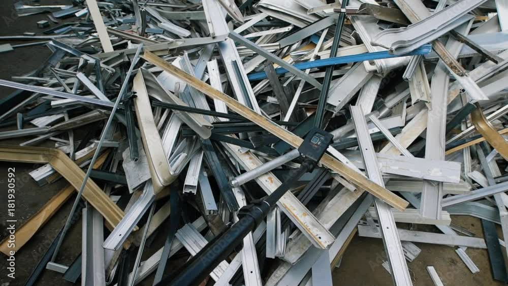 Plenty of abstract various trash on yard of recycling factory Plenty of abstract various trash on yard of recycling factory