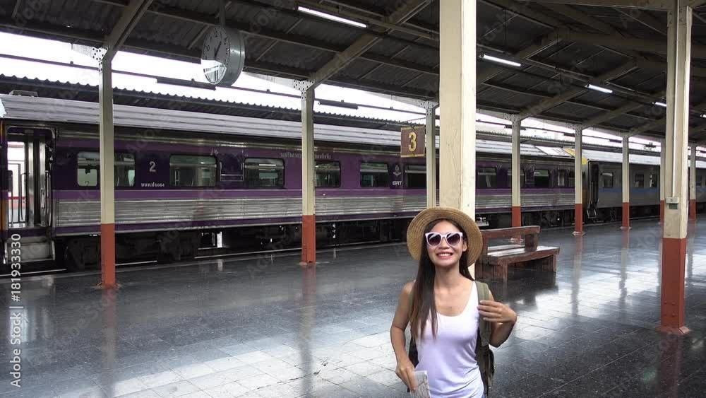 Travel by train, Girl traveling the tourist train station. Travel by train, Girl traveling the tourist train station.