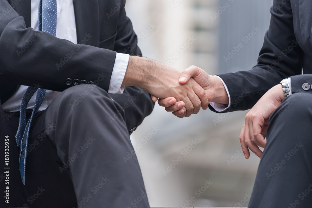 two business man shaking hands