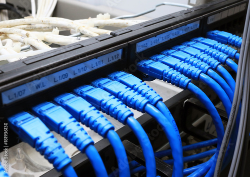 internet wires cable system in rack server switch center.