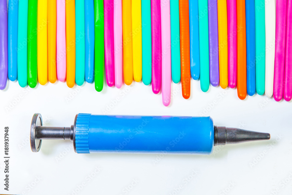 balloon twisting on white background with balloon pump balloon twisting on white background with balloon pump