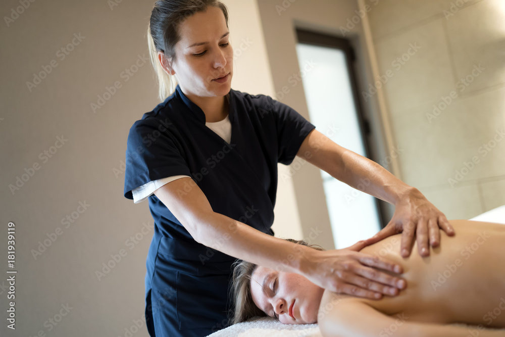 Fototapeta premium Professional masseur working on client