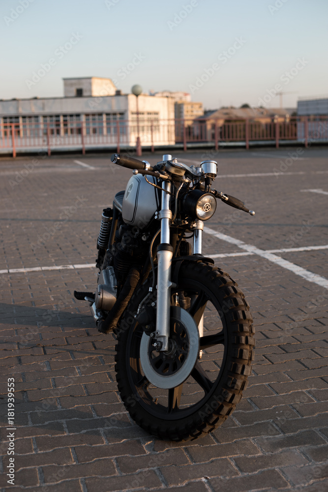 Vintage custom motorcycle on parking