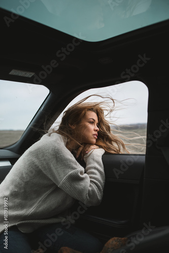 wonderful chilling girl travelling in the car