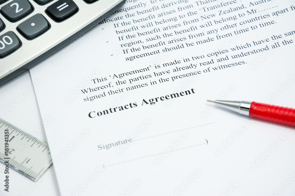 contracts agreement sign on document paper with red pen contracts agreement sign on document paper with red pen