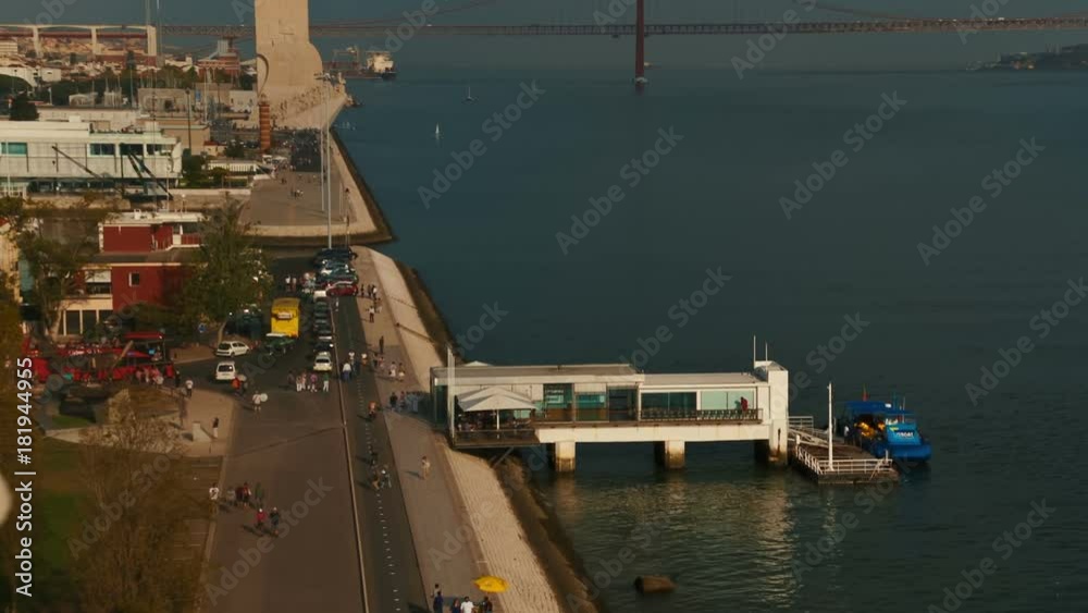 Telephoto shot of the Belem area in Lisbon featuring the Padrao dos Descobrimentos and Ponte 25 de Abril bridge