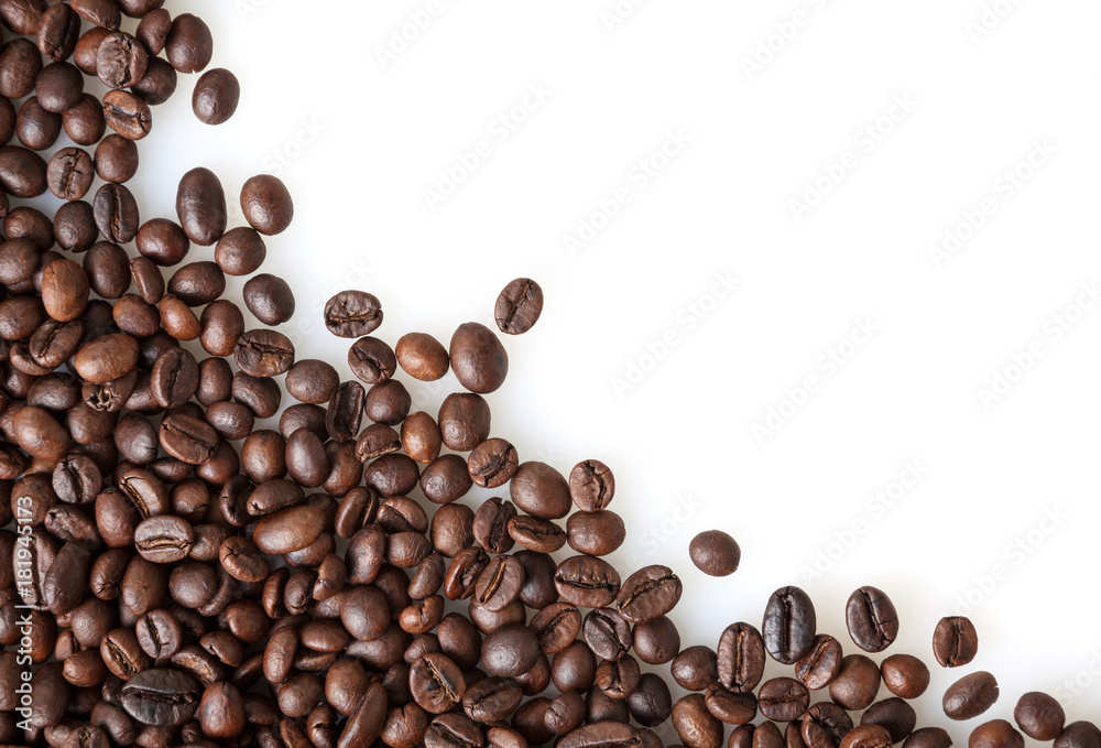 Roasted coffee beans on white background