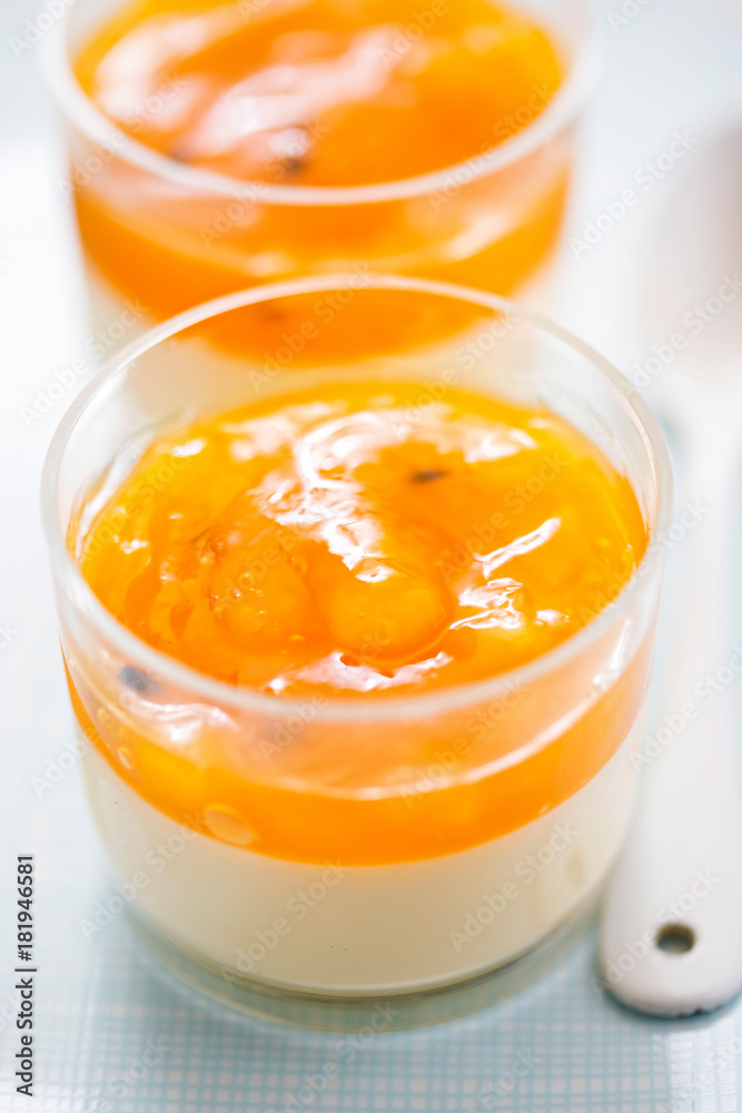 Panna cotta dessert with mango and passion fruit jelly Panna cotta dessert with mango and passion fruit jelly