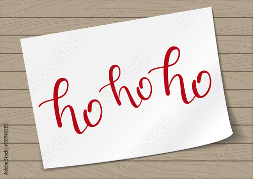 Ho-ho-ho Hand Drawn Lettering on A4 Paper Sheet Background. Vector Illustration Quote. Handwritten Inscription Phrase for New Year Holiday Design, Poster, Sale, Banner, Invitation.