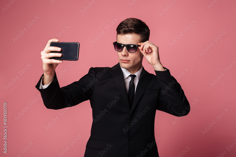 Serious young businessman Serious young businessman