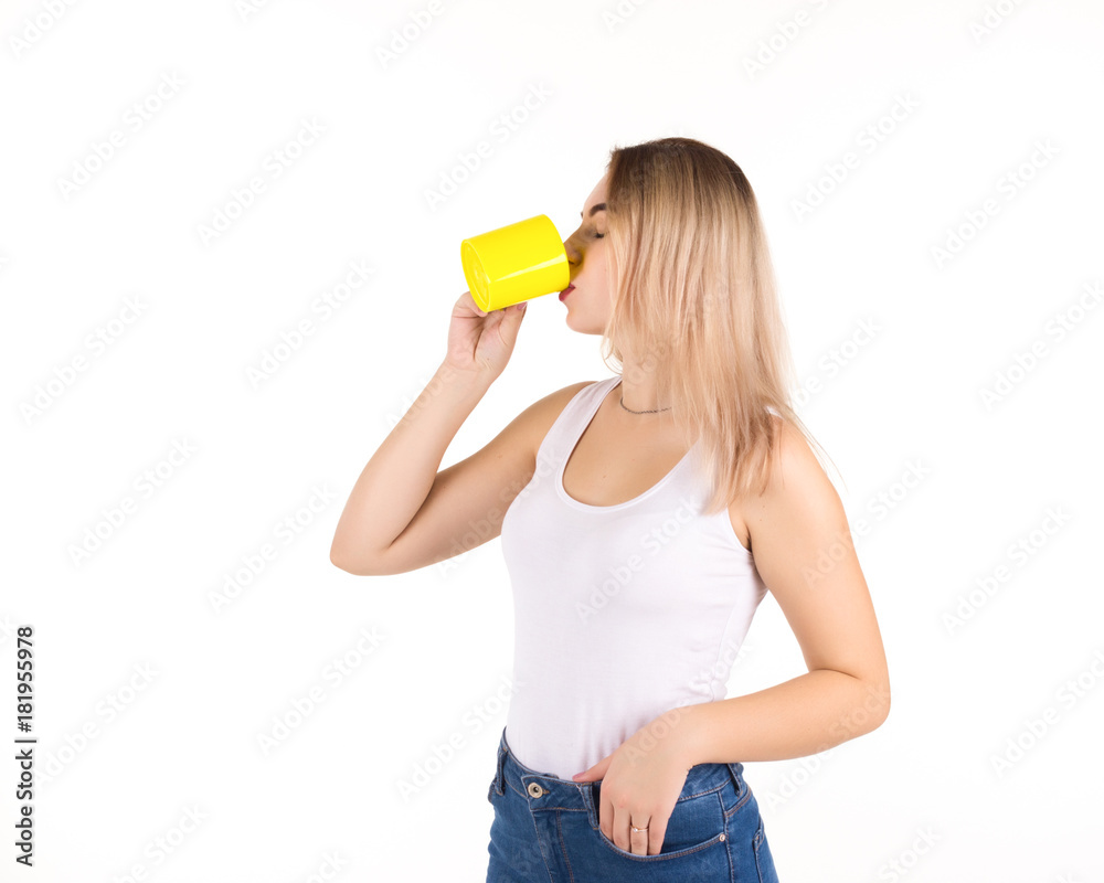 Young cute woman drinks coffee or tea, isolated Young cute woman drinks coffee or tea, isolated