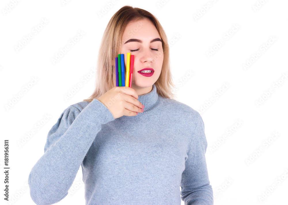 Young pretty woman with markers, isolated Young pretty woman with markers, isolated