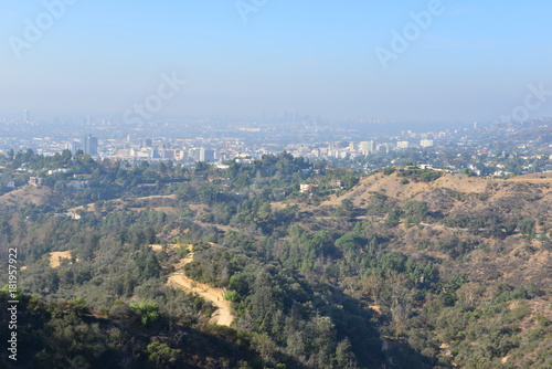 The Hollywood Hills overlooking a misty Los Angeles in the early morning   © paulbriden