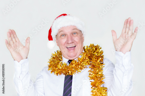 Cheerful amazed man winning Christmas giveaway