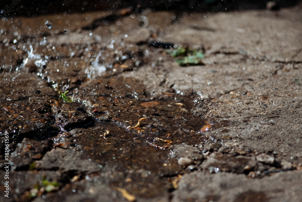 Rain spray on old concrete. Rain spray on old concrete.