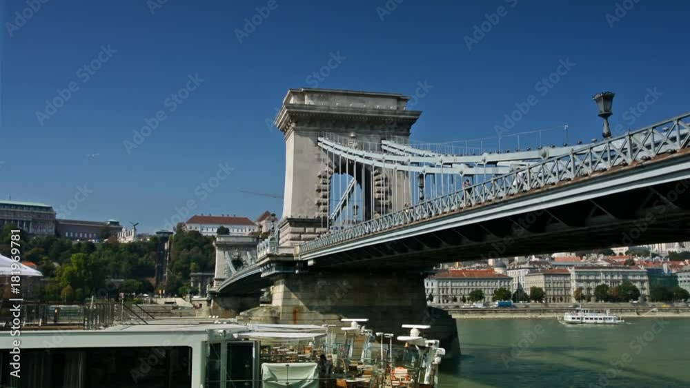 Ferries and pedestrians in the chain bridge in Budapest, Hungary