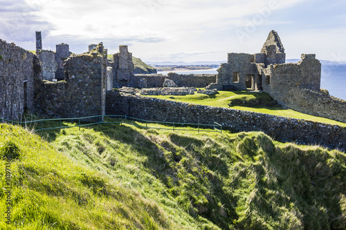 Dunluce Castle (Irish: Dún Libhse), a now-ruined medieval castle located on the edge of a basalt outcropping in County Antrim, Northern Ireland
