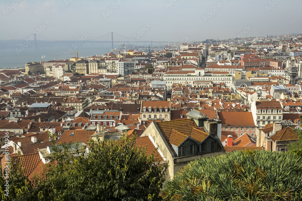 Fototapeta premium Lisbon from above: view of Baixa district and Rio Tejo (River Tagus) from Castelo de Sao Jorge