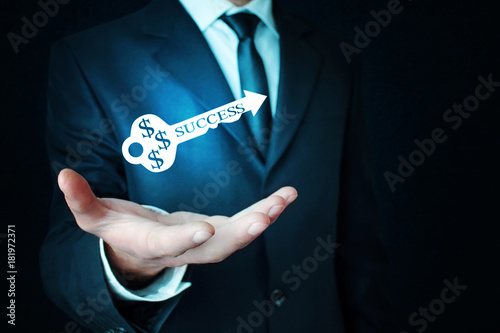 Man holding success key. Solution concept