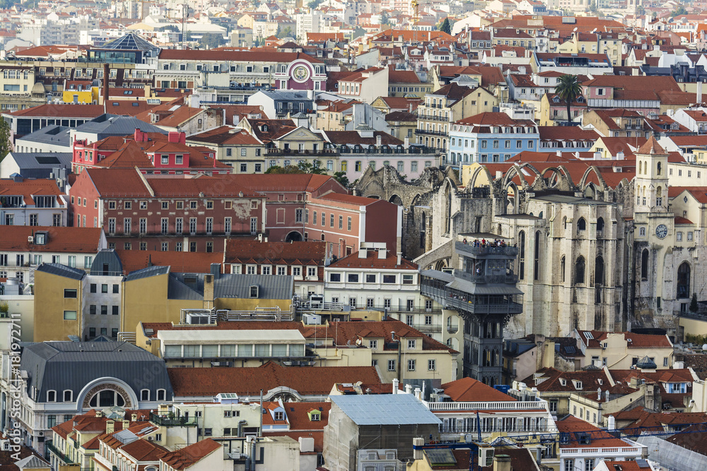 Lisbon from above: view of Baixa district with Santa Justa Lift, also called Carmo Lift and Convento da Ordem do Carmo, historical church. View from Castelo de Sao Jorge.
