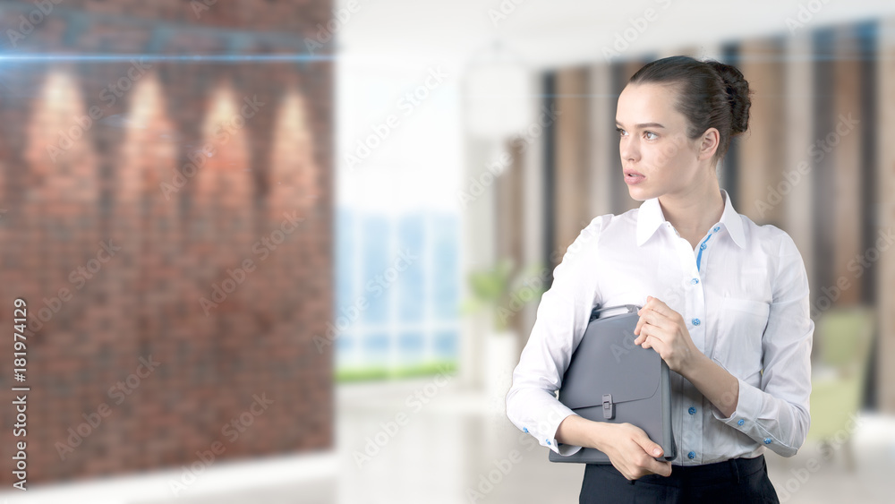 Young Business woman over interior background Young Business woman over interior background