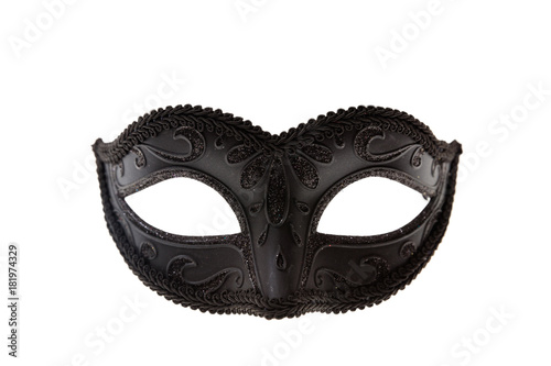 Black Venetian carnival mask isolated on white background photo
