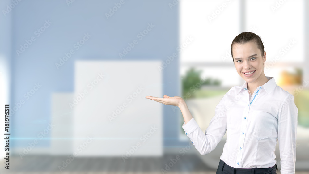 Young beautiful business woman and creative designer standing over blured interior background Young beautiful business woman and creative designer standing over blured interior background