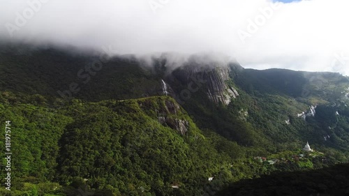 Aerial view in the clouds of Adam Peak in Sri Lanka in sunny day