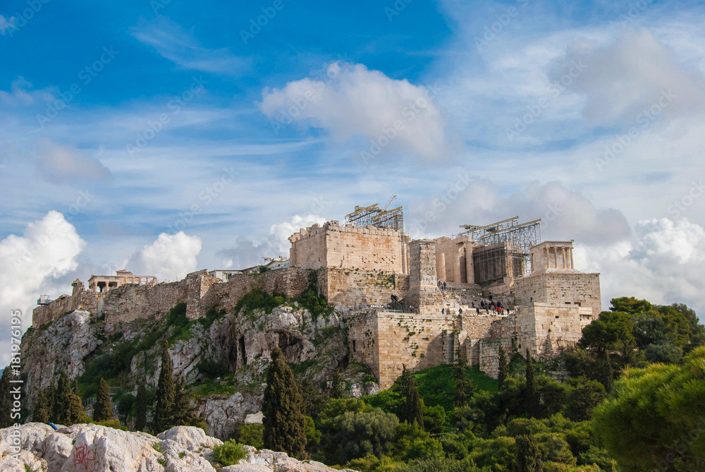A picturesque cloudy scenery of Acropolis sacred hill in Athens, Greece