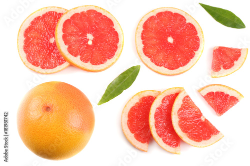 healthy food. sliced grapefruit with green leaf isolated on white background top view