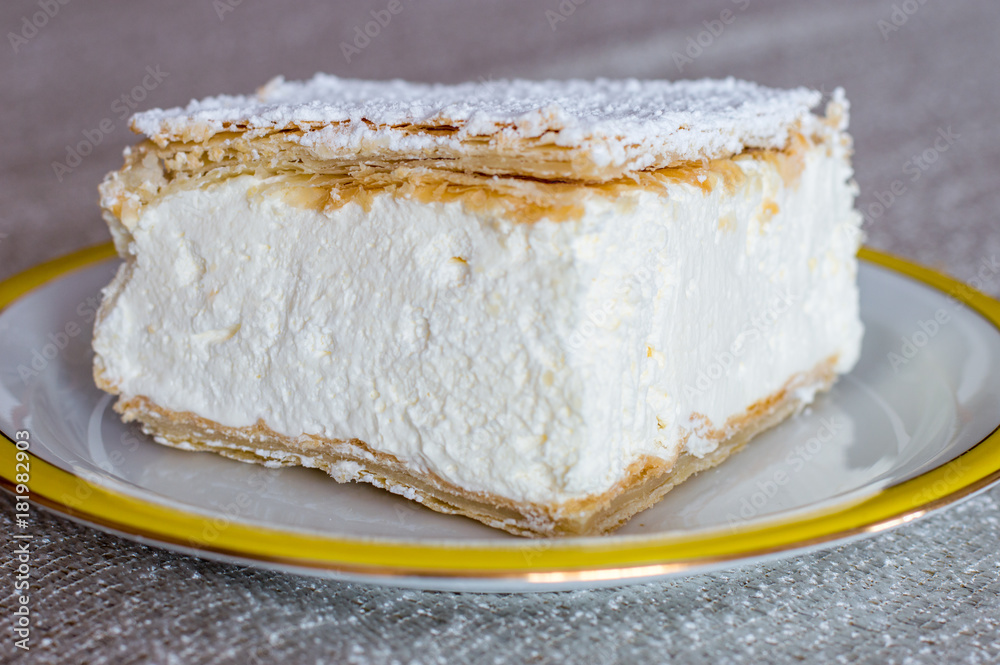 Traditional polish cream pie Napoleonka known also as kremowka. Traditional polish cream pie Napoleonka known also as kremowka.