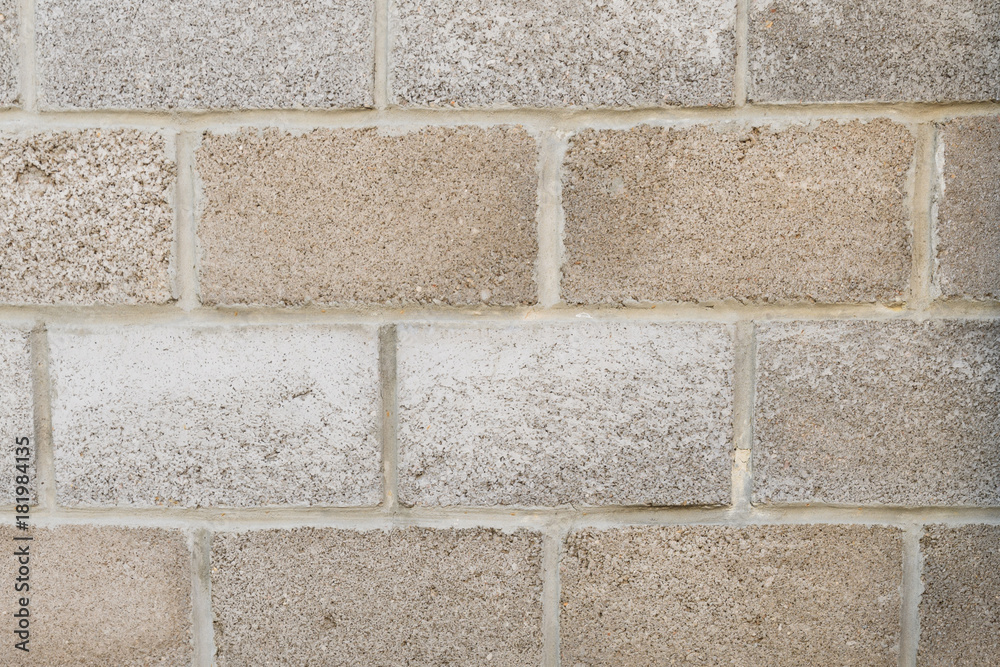 Fototapeta premium Fence construction material French brick free rows, classic masonry closeup, concept Foundation, background