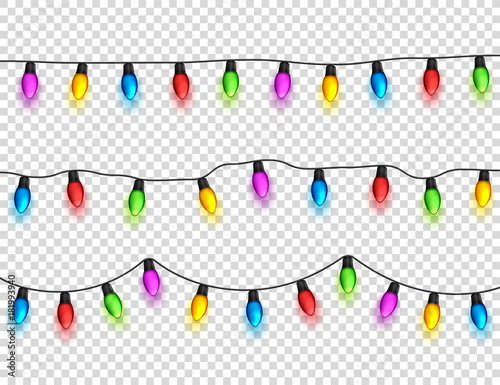 Christmas glowing lights on transparent background. Garlands with colored bulbs. Xmas holidays. Christmas greeting card design element. New year,winter.