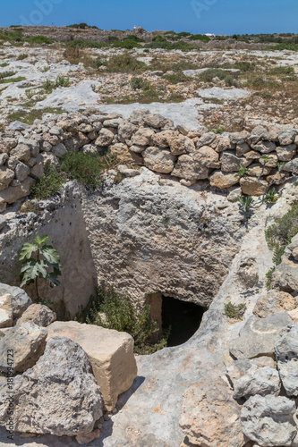 Mysterious ancient cart ruts at Misrah Ghar il-Kbir aka Clapham Junction, a prehistoric site near the Dingli Cliffs, Siggiewi, Malta photo
