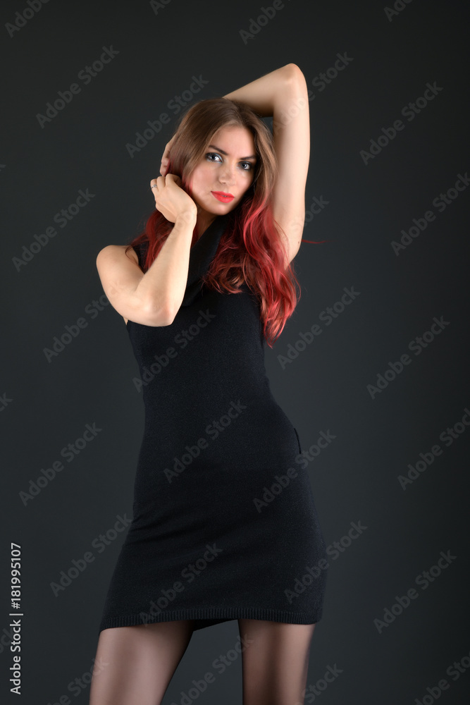 girl with long red and shiny wavy hair . Beautiful model with curly hairstyle . girl with long red and shiny wavy hair . Beautiful model with curly hairstyle .