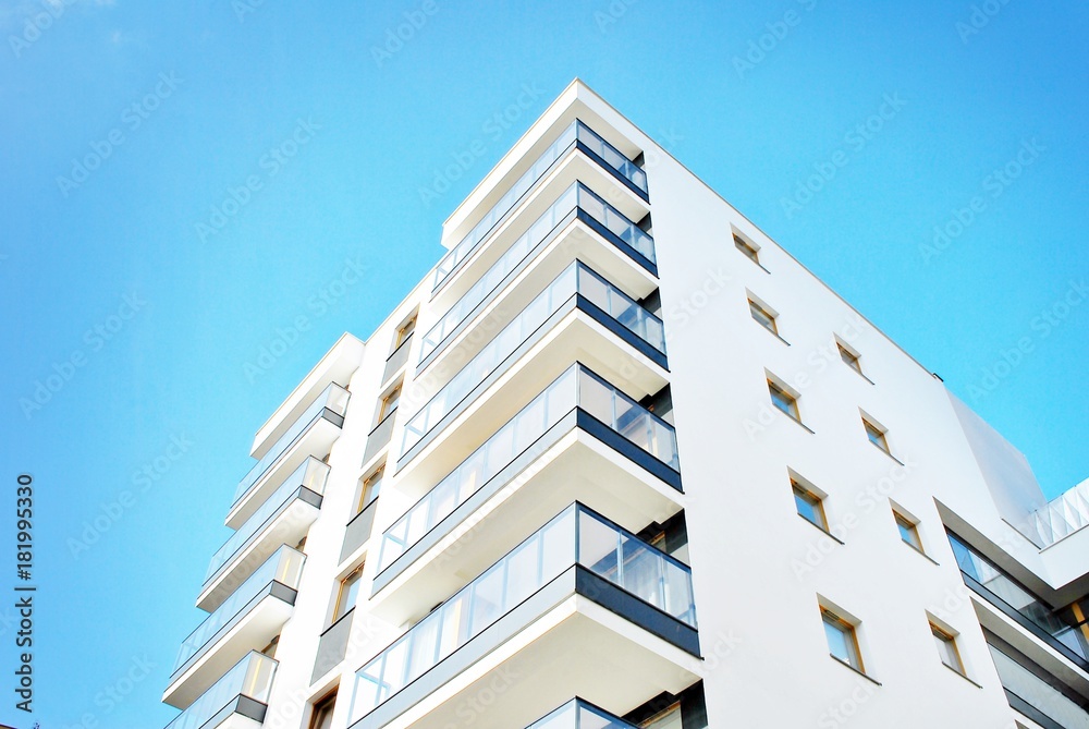 Modern apartment buildings on a sunny day with a blue sky. Facade of a