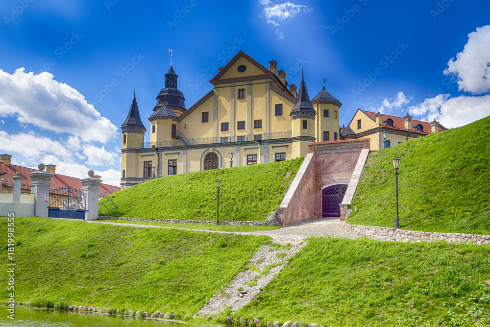 Travel Concepts and Tourist Destinations. Renowned Nesvizh Castle on The Hill as a Profound Example of Medieval Ages Heritage and Residence of the Radziwill Family.
