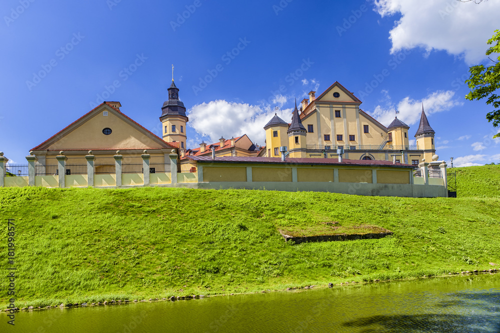 Famous Tourist Destinations.Backside of  Renowned Nesvizh Castle on The Moat as a Profound Example of Medieval Ages Heritage and Residence of the Radziwill Family.