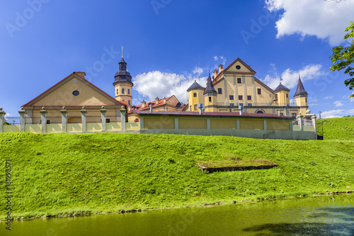 Famous Tourist Destinations.Backside of Renowned Nesvizh Castle on The Moat as a Profound Example of Medieval Ages Heritage and Residence of the Radziwill Family.