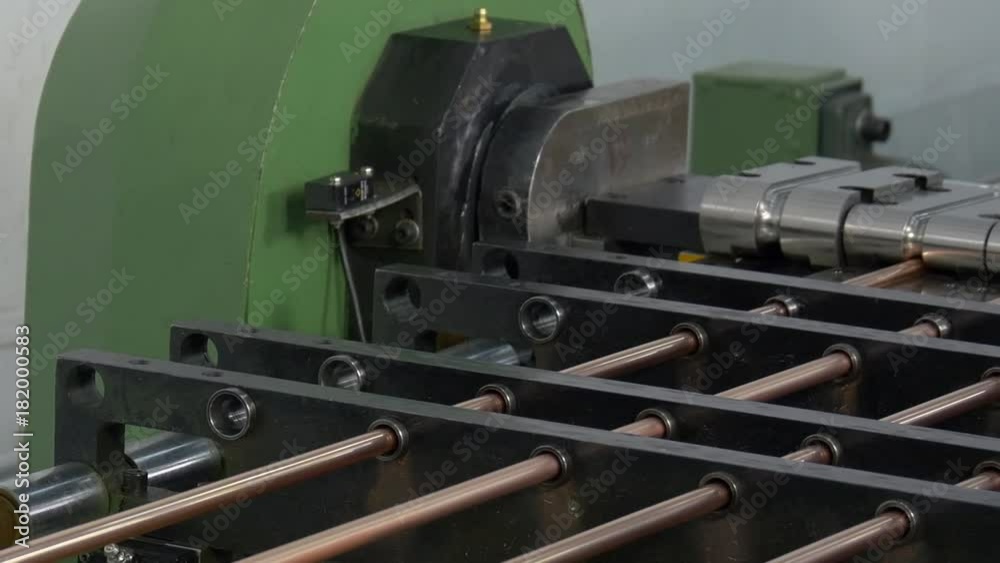 Bending and cutting metal copper pipes tubes on industrial CNC machine. Automation of work. Refrigeration and ventilation equipment and air conditioners. Modern technologies. Bending and cutting metal copper pipes tubes on industrial CNC machine. Automation of work. Refrigeration and ventilation equipment and air conditioners. Modern technologies.