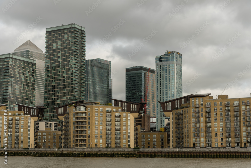 Picturesque East London buildings viewed from the Thames river
