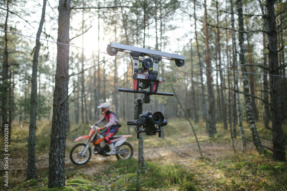 Enduro journey with dirt bike high in the mountains cablecam shooting Enduro journey with dirt bike high in the mountains cablecam shooting